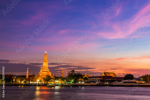 Light up Wat Arun temple at night in Bangkok, Thailand.