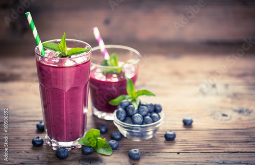 Fresh blueberry smoothie in the glass