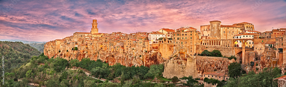 Pitigliano, Grosseto, Tuscany, Italy: landscape at dawn of the medieval village on the tuff hill