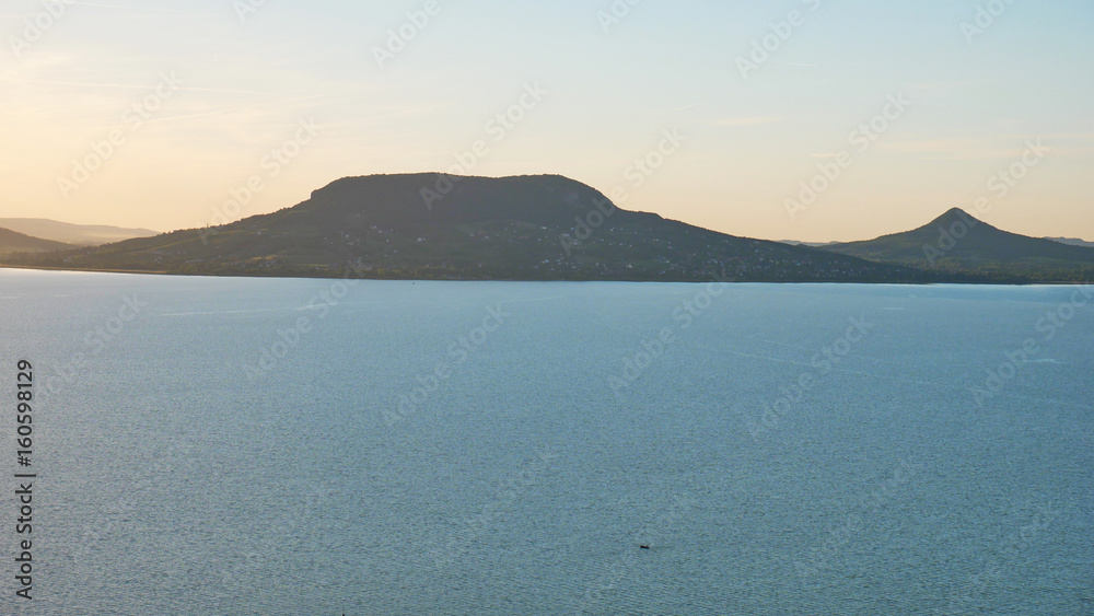 One of Europe's largest lakes - Balaton. Popular tourist tours from many continental countries. Shallow fast warming lake. One of Europe's largest lakes - Balaton. Popular tourist tours from many continental countries. Shallow fast warming lake.