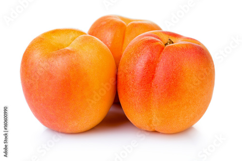 Ripe apricot fruits isolated on white