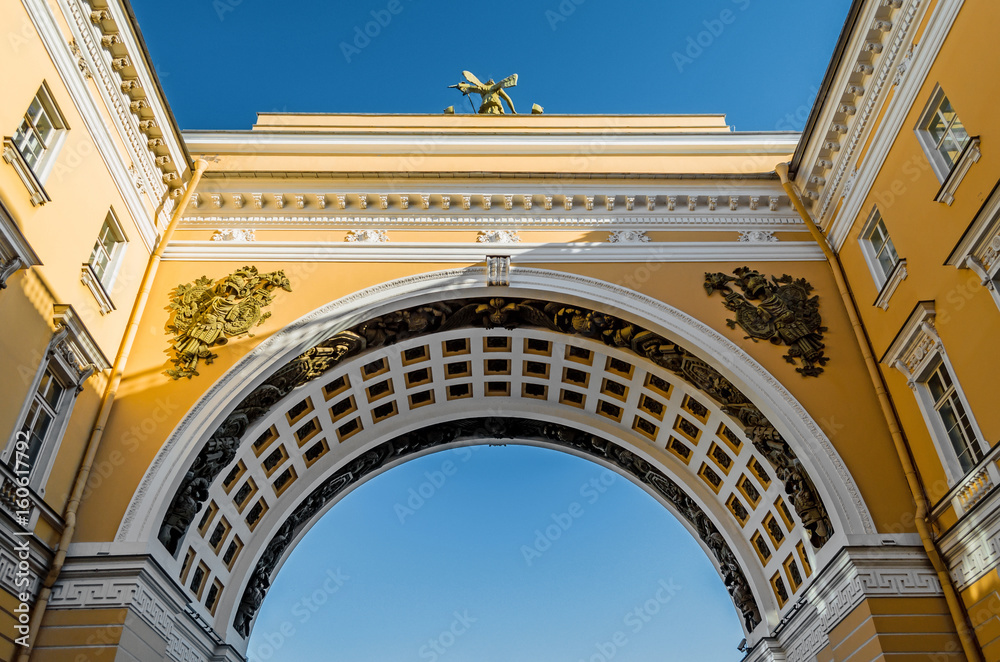 Arch, palace square, view up blue sky.