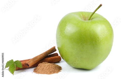 cinnamon with green apple isolated on white background