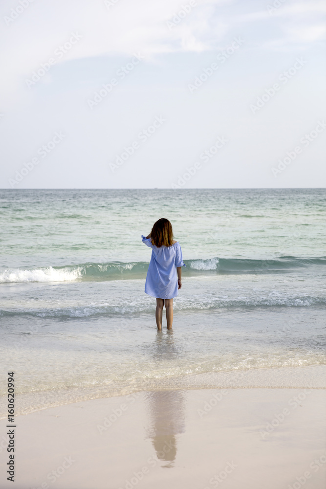Young woman in ocean