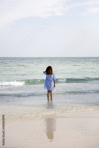 Young woman in ocean