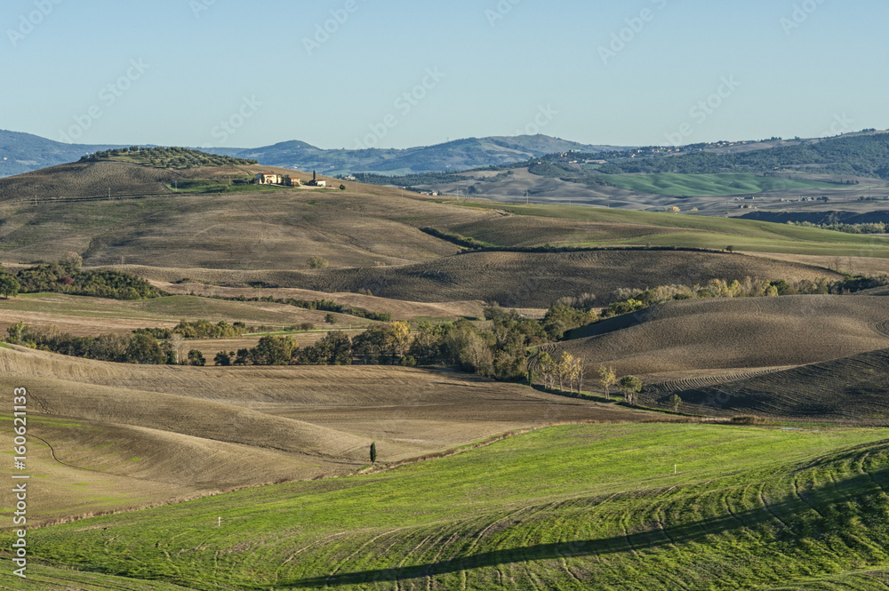 VAL D`ORCIA, TUSCANY-ITALY, OCTOBER 30, 2016: Scenic Tuscany landscape with rolling hills and valleys in autumn, Val d'Orcia, Italy