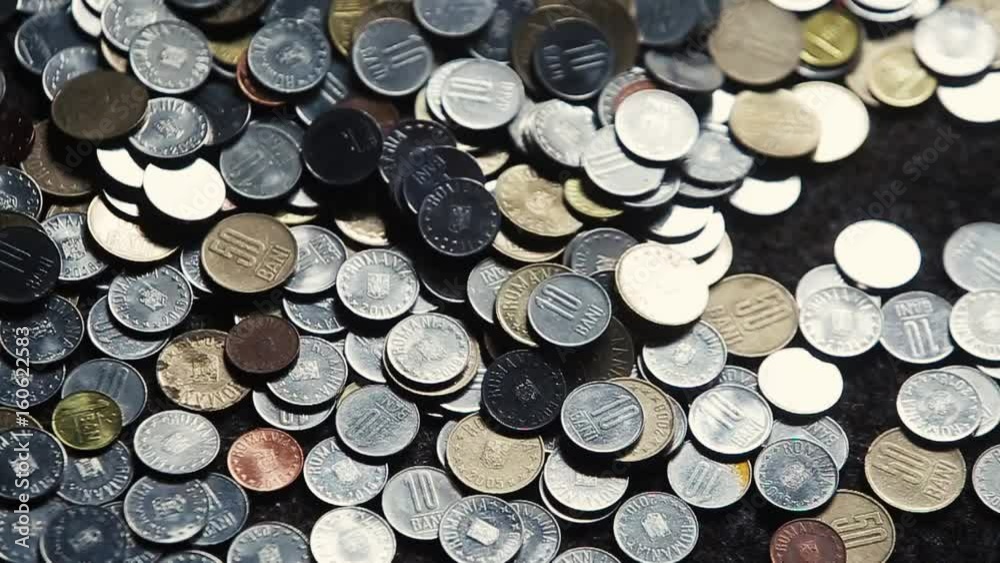 Man handles Romanian Lei coins Man handles Romanian Lei coins