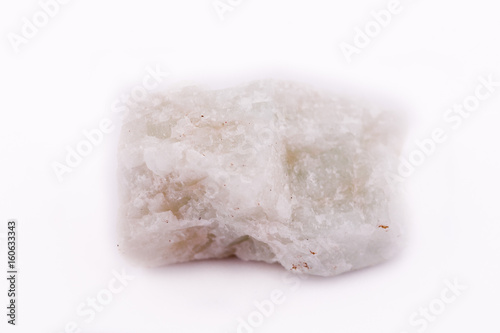 macro mineral aquamarine stone on a white background