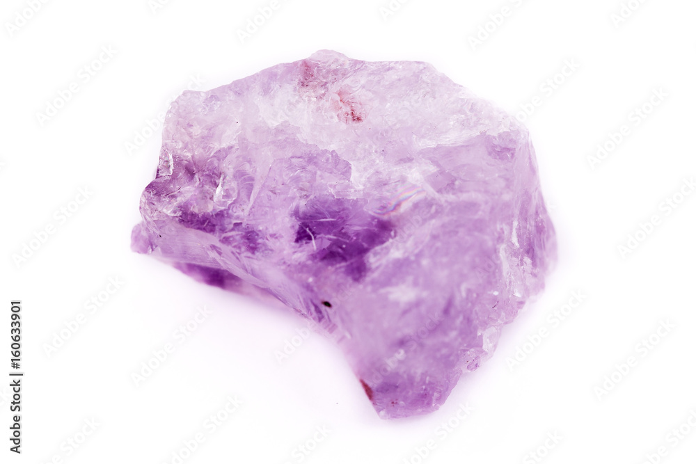 Macro Mineral Stone Amethyst on a white background Macro Mineral Stone Amethyst on a white background