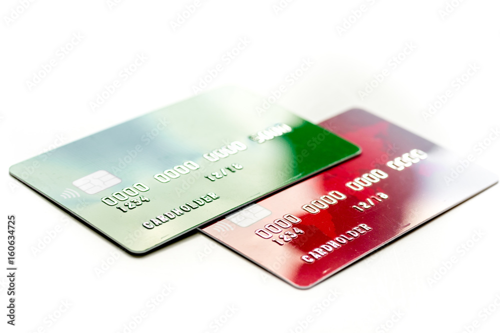 Payment composition with business credit cards at work place white background close up Payment composition with business credit cards at work place white background close up