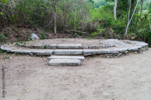 Remnants of a house of indigenous Kogi people in Tayrona National Park, Colombia photo