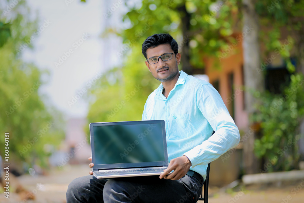 Man showing laptop Screen Man showing laptop Screen