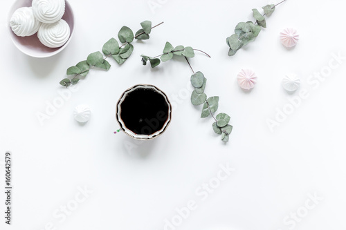 sweet lunch with marsh-mallow and spring flowers for woman on white background top view mockup