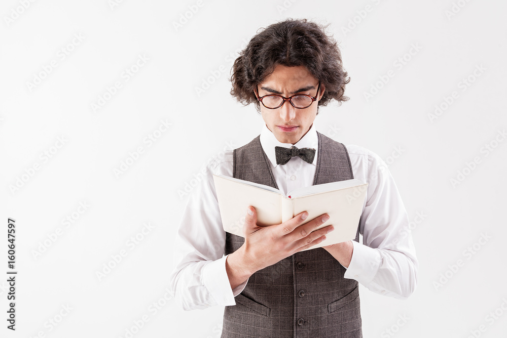 Serious male student is interested in literature Serious male student is interested in literature