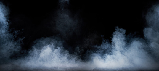 Image of dense fume swirling in the dark interior