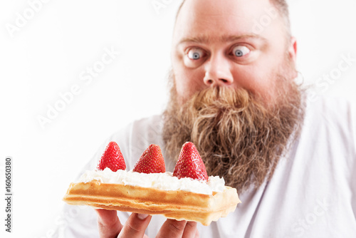 Man staring at dessert photo