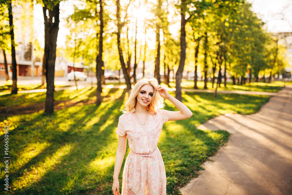 Portrait of young beautiful happy girl on background of the summer forest Portrait of young beautiful happy girl on background of the summer forest