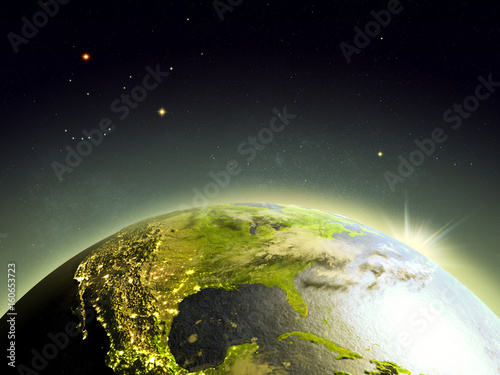 Fototapeta Naklejka Na Ścianę i Meble -  North America from space in sunrise
