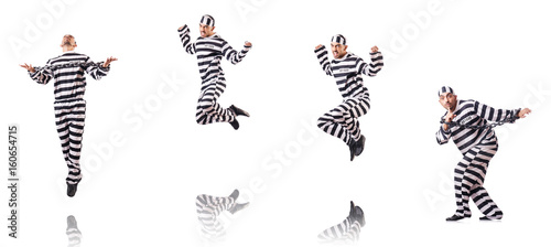 Convict criminal in striped uniform