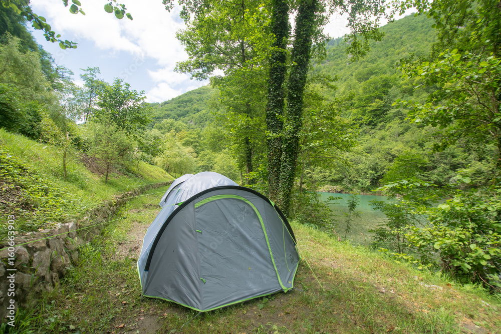 Tent in nature - camping beauty of nature, green woods