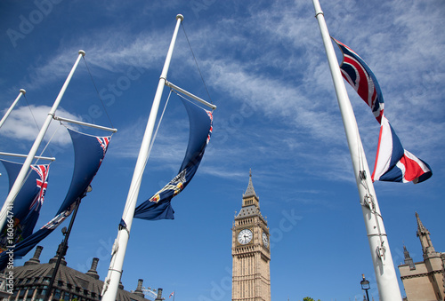 england flags in the wind in front of Big Ben, London, UK