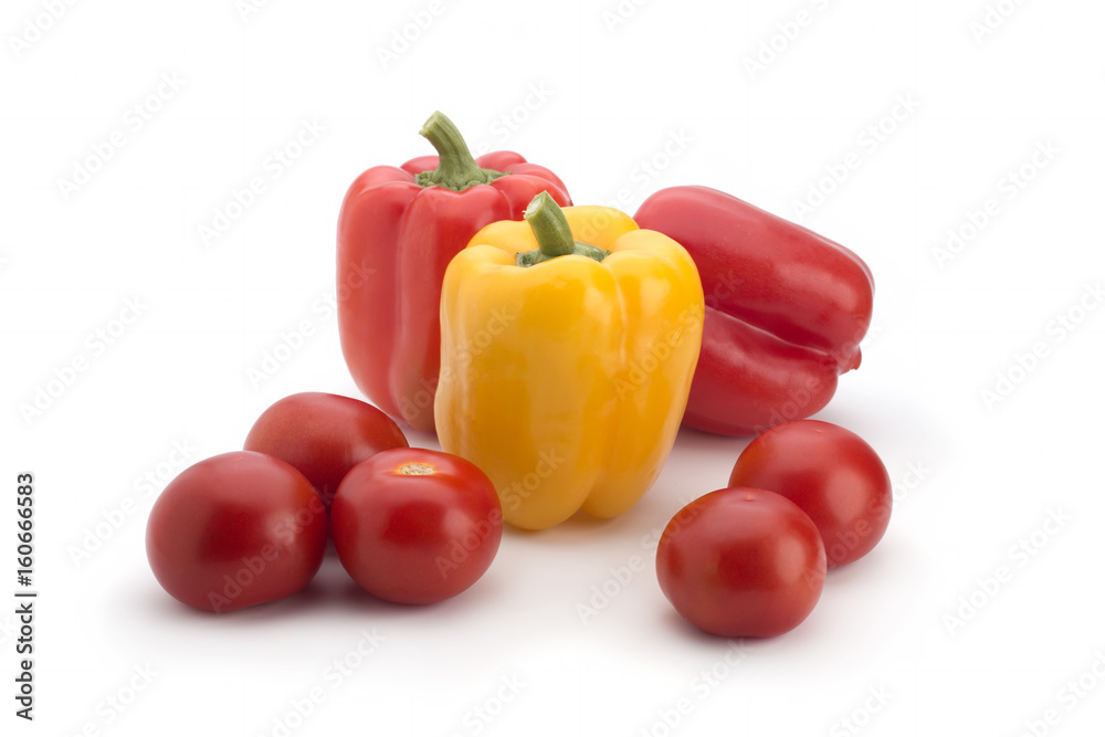 Red peppers and tomatoes on a white background Red peppers and tomatoes on a white background