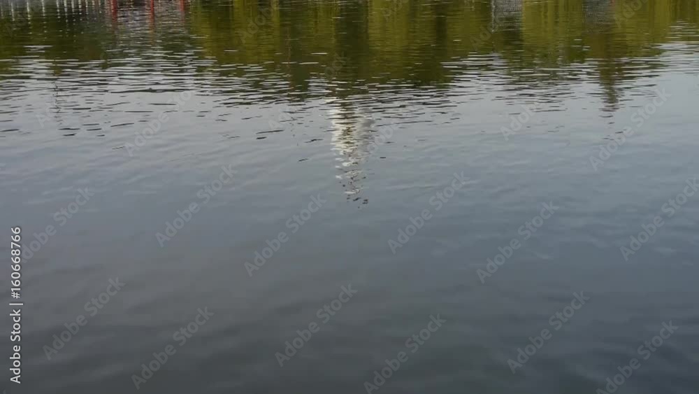 China Beijing ancient architecture Beihai Park white tower reflected in water. China Beijing ancient architecture Beihai Park white tower reflected in water.
