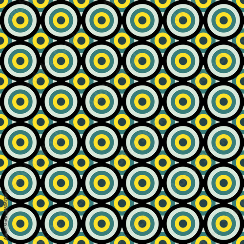 Seamless colorful pattern made by vivid circles of yellow, green and black