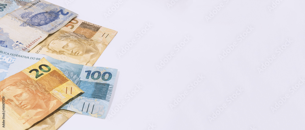 Brazilian money background. Bills called Real, different values. Economy of Brazil concept image. Brazilian money background. Bills called Real, different values. Economy of Brazil concept image.