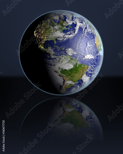Globe facing Americas in dark
