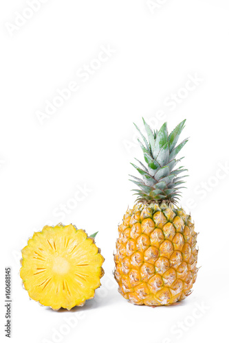 pineapple with slices isolated on white background.