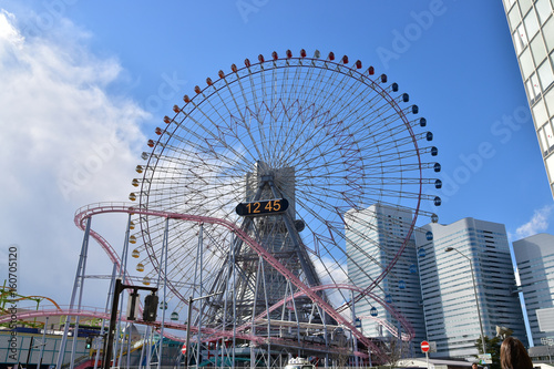 Scenery of high-rise building and Ferris wheel of Yokohama city of blue sky