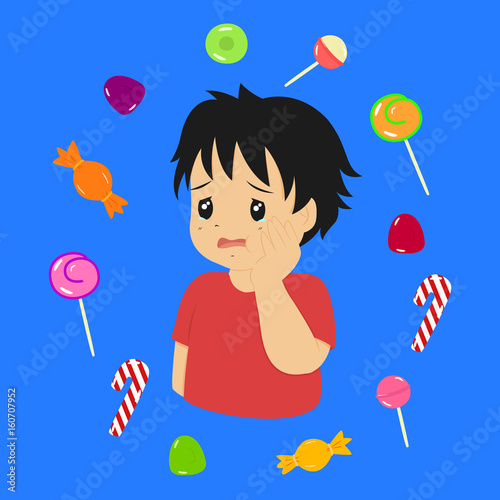 a boy has a toothache because he ate too much candies