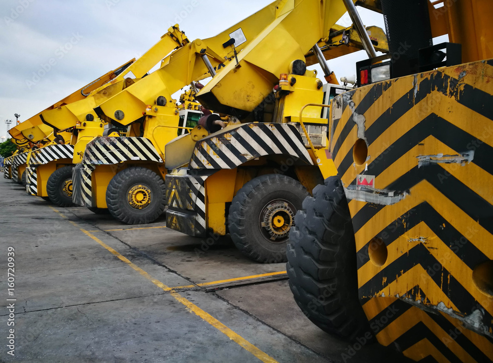 Parking Space Area With Yellow Strip Line For Heavy Transportation Equipment Container Handlers Parking Space Area With Yellow Strip Line For Heavy Transportation Equipment Container Handlers