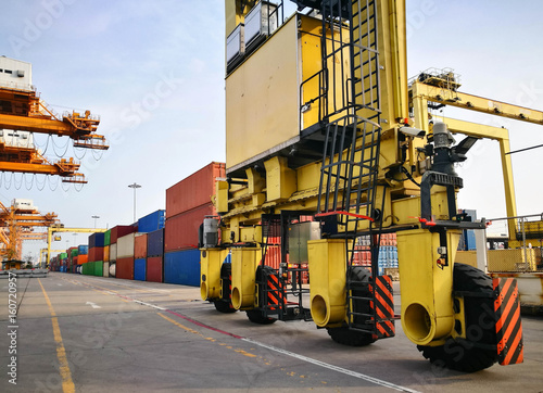 Close Up Wheel Rubber Tried Gantry Cranes (RTG) At Industrial Port