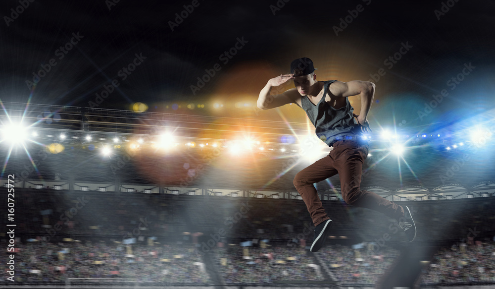 Naklejka premium B-boy performing some moves . Mixed media