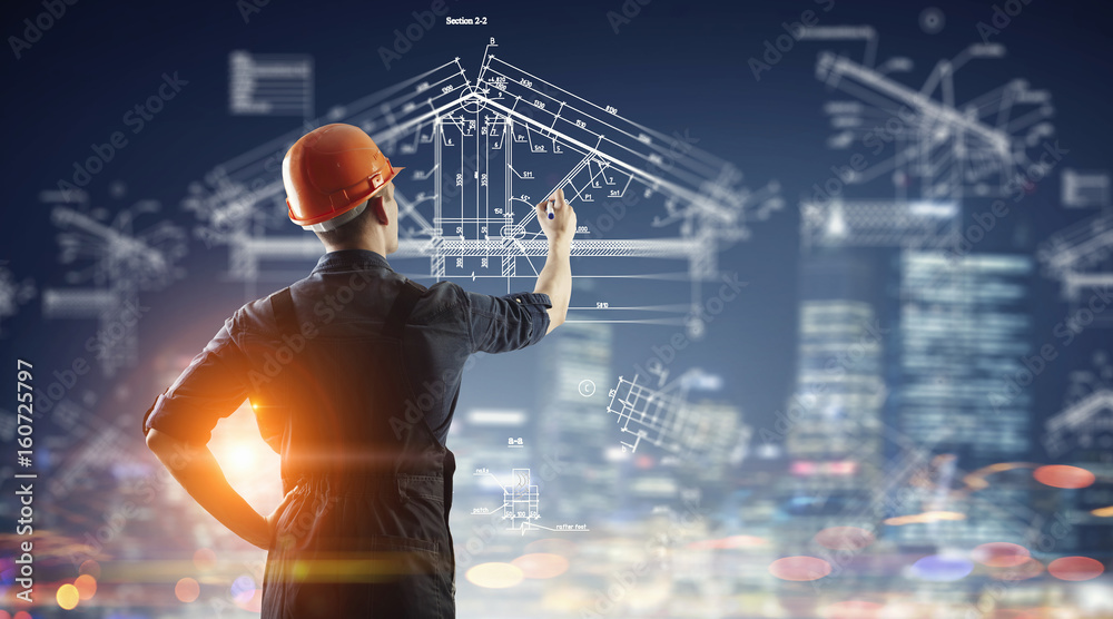 Fototapeta premium Builder man draw project