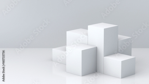 White cube boxes with white blank wall background for display. 3D rendering.  