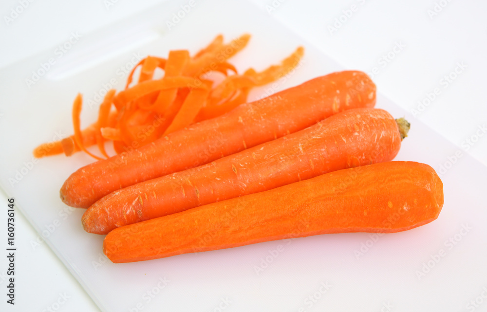 Carrot and peel isolated on white background. Carrot and peel isolated on white background.