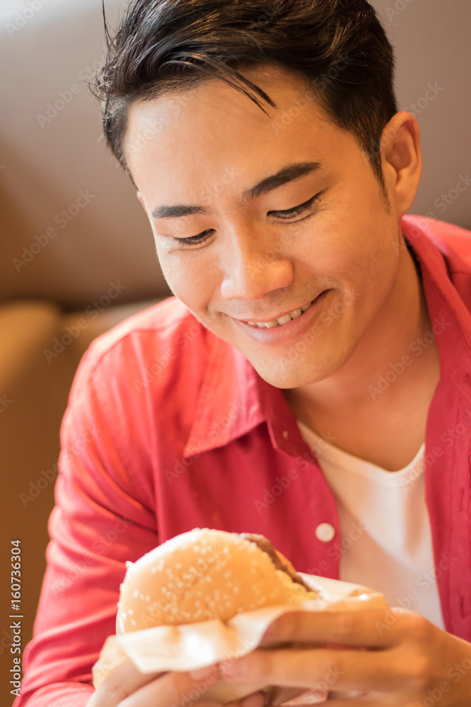 man eating burger, concept of unhealthy junk food, fast food man eating burger, concept of unhealthy junk food, fast food