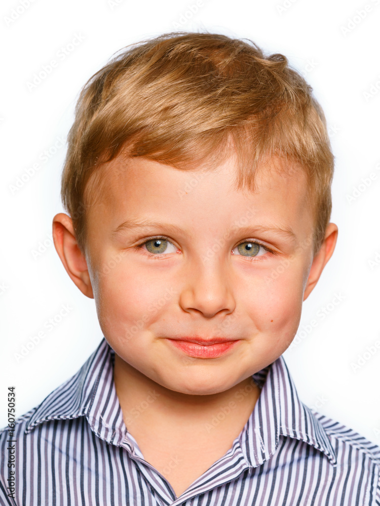 His first experience to make photo for passport or ID card. Emotionally grimacing little boy with blond hair and bright green eyes. White background. His first experience to make photo for passport or ID card. Emotionally grimacing little boy with blond hair and bright green eyes. White background.