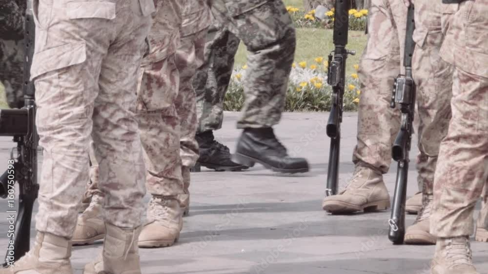 Detail of the militar personal on a parade. Slow motion Detail of the militar personal on a parade. Slow motion