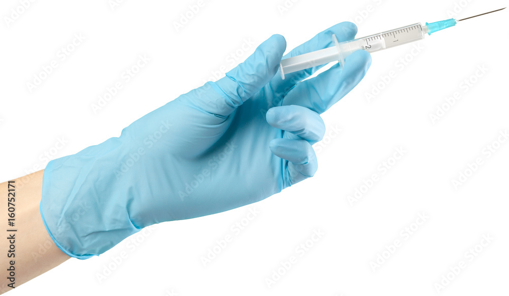Syringe in hand isolated on white Syringe in hand isolated on white