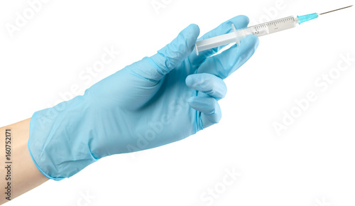 Syringe in hand isolated on white