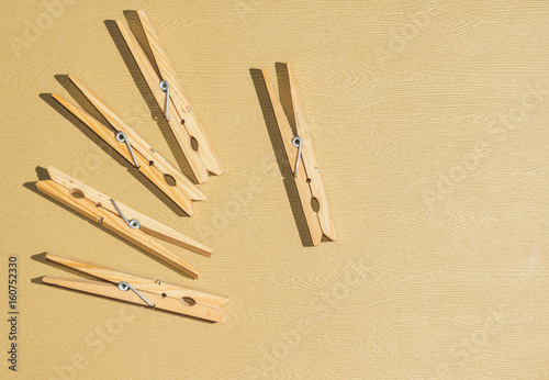 Clothespins on a light brown background