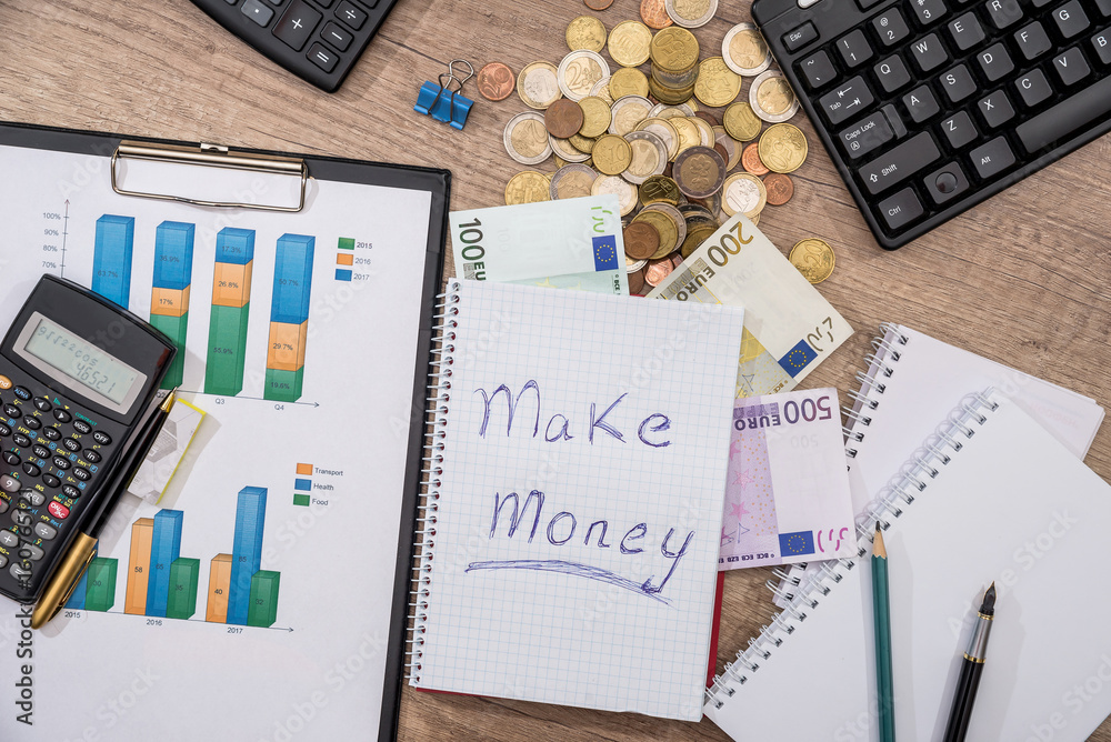 Make money on notepad - business chart, euro banknotes, pen, calculator, pen,  coin, keyboard. Top view. business concept Stock Photo | Adobe Stock