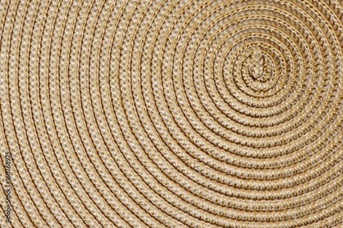 Closeup of a woven straw background. Top view