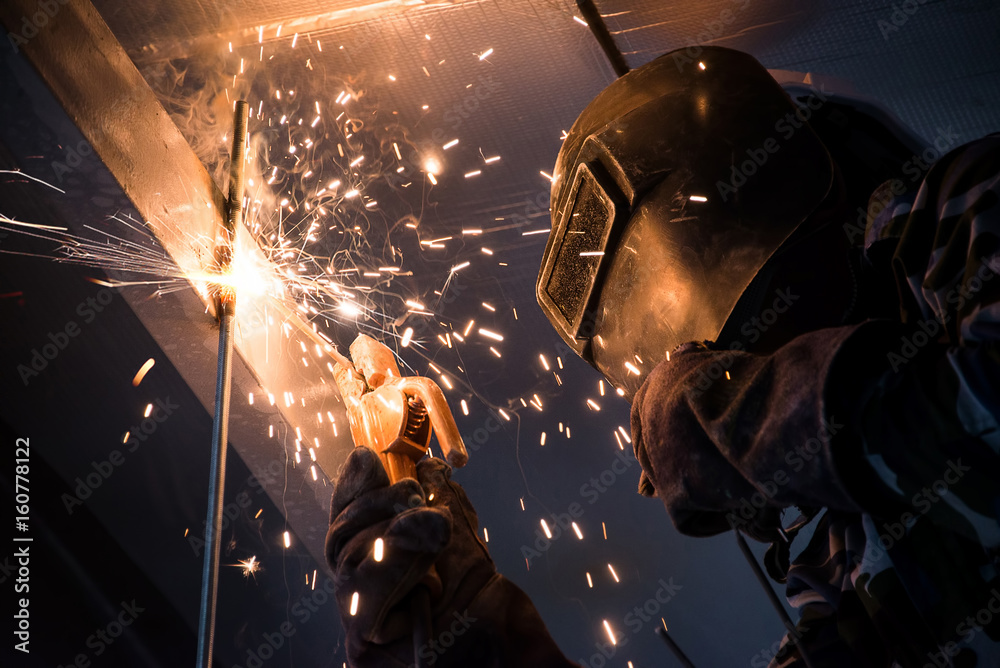 Arc welding of a steel in construction site Arc welding of a steel in construction site