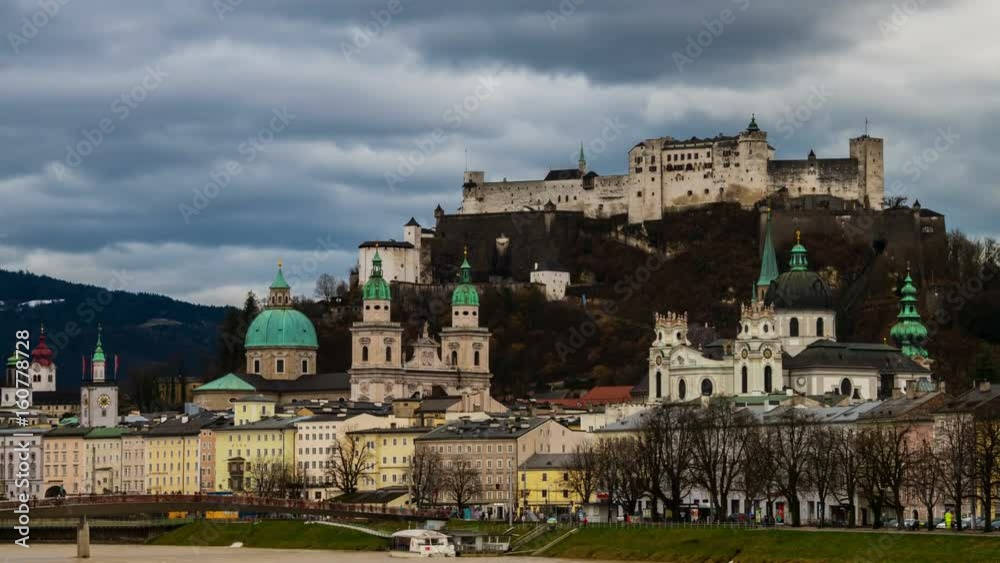Salzburg, Austria. View of Salzburg, Austria in the evening. Castle and other historical buildings. Dark fast pacing sky, time-lapse Salzburg, Austria. View of Salzburg, Austria in the evening. Castle and other historical buildings. Dark fast pacing sky, time-lapse