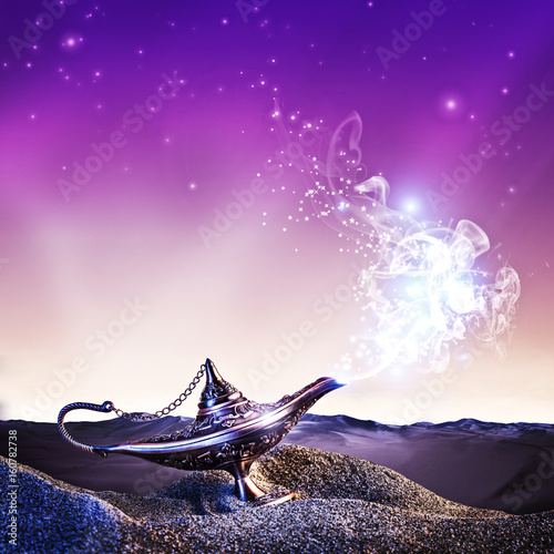  aladino lamp  magical smoke  starry night  desert. magic  fairy tale concept. photo